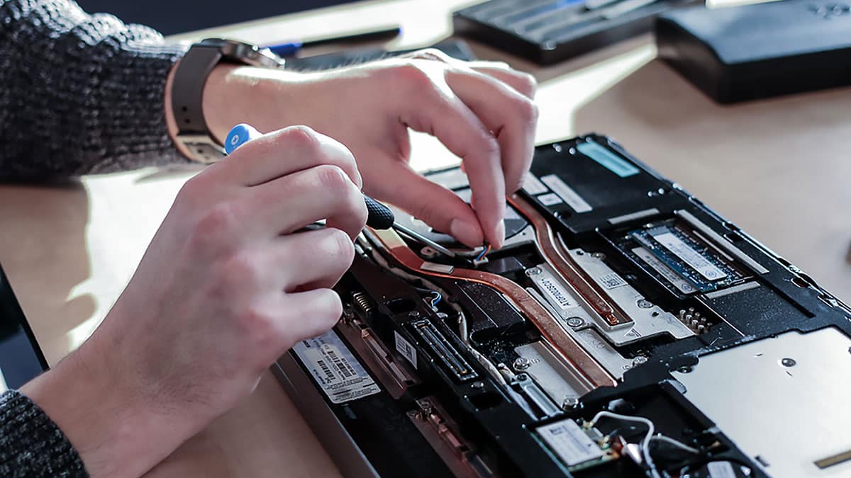 laptop-repair-technician-computer-motherboard-circuit-system