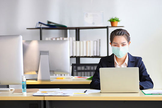 employee-mask-work-social-distance-business-office-coronavirus-covid19