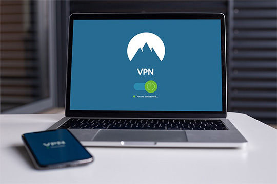 A laptop with the word vpn on the screen.