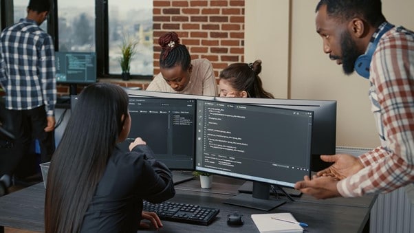 developers-coders-programming-team-work-office-desktop-web-application