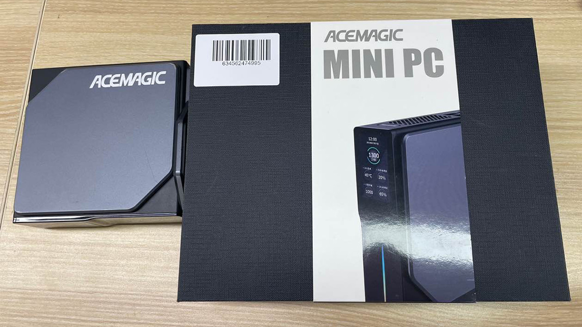 A box with an ACEMAGIC S1 Mini PC sitting on top of it.
