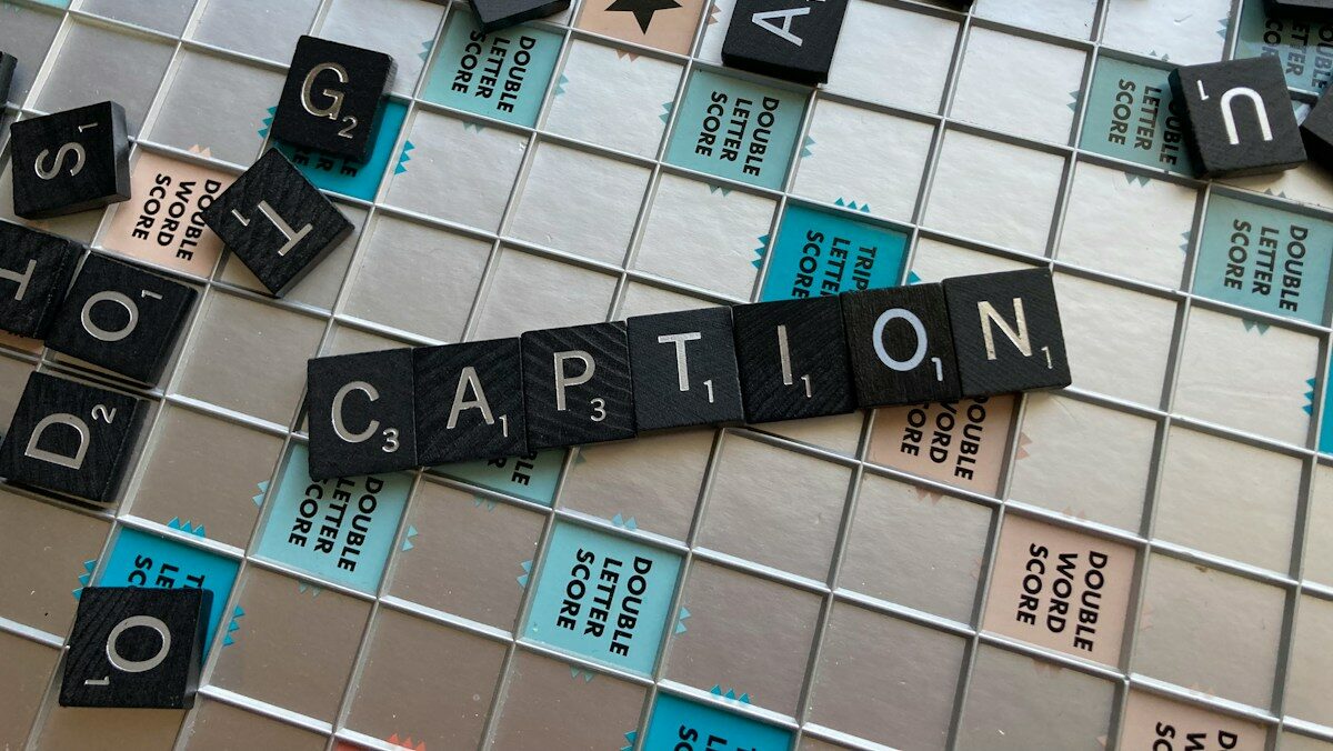 A scrabble board with the word cartion spelled out.